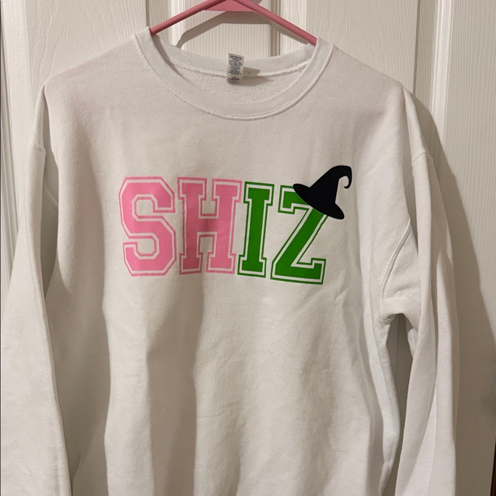 Woman’s White Sweatshirt with Pink & Green Lettering and Black Witch Hat Graphic